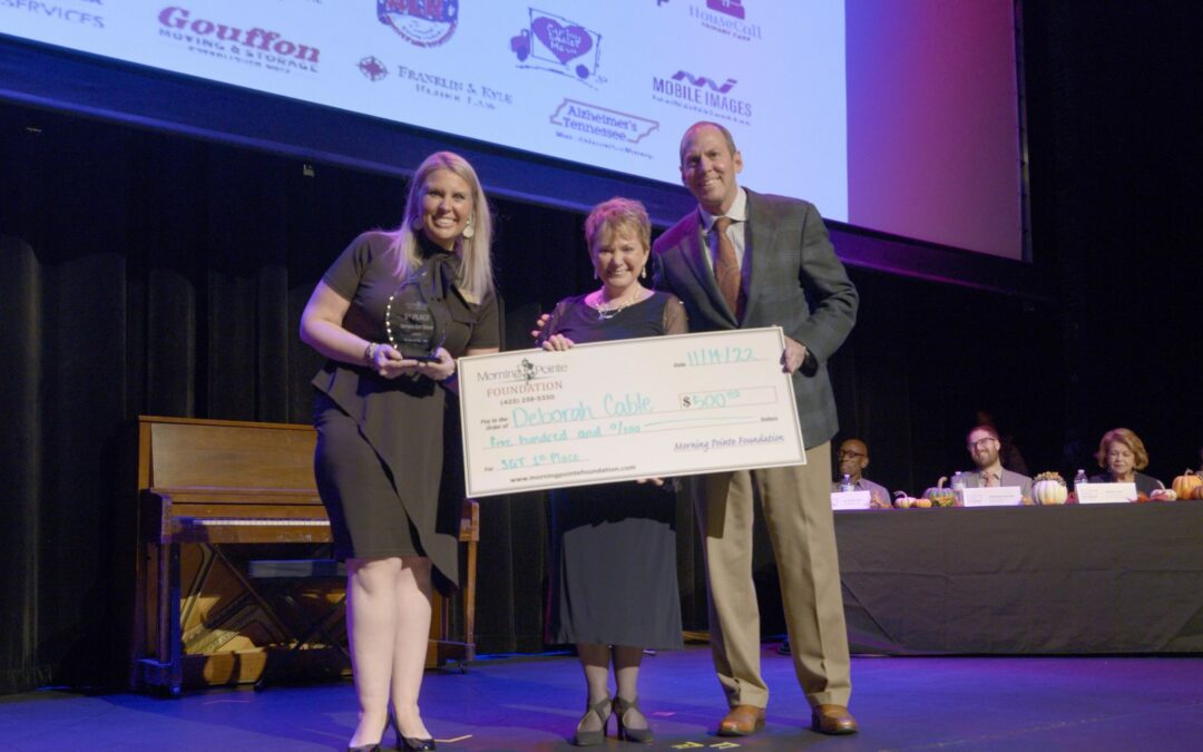 photo of (left to right): Miranda Perez, Morning Pointe Foundation Executive Director; Deborah Cable, grand-prize winner; and Franklin Farrow, Morning Pointe Senior Living Co-Founder and CEO